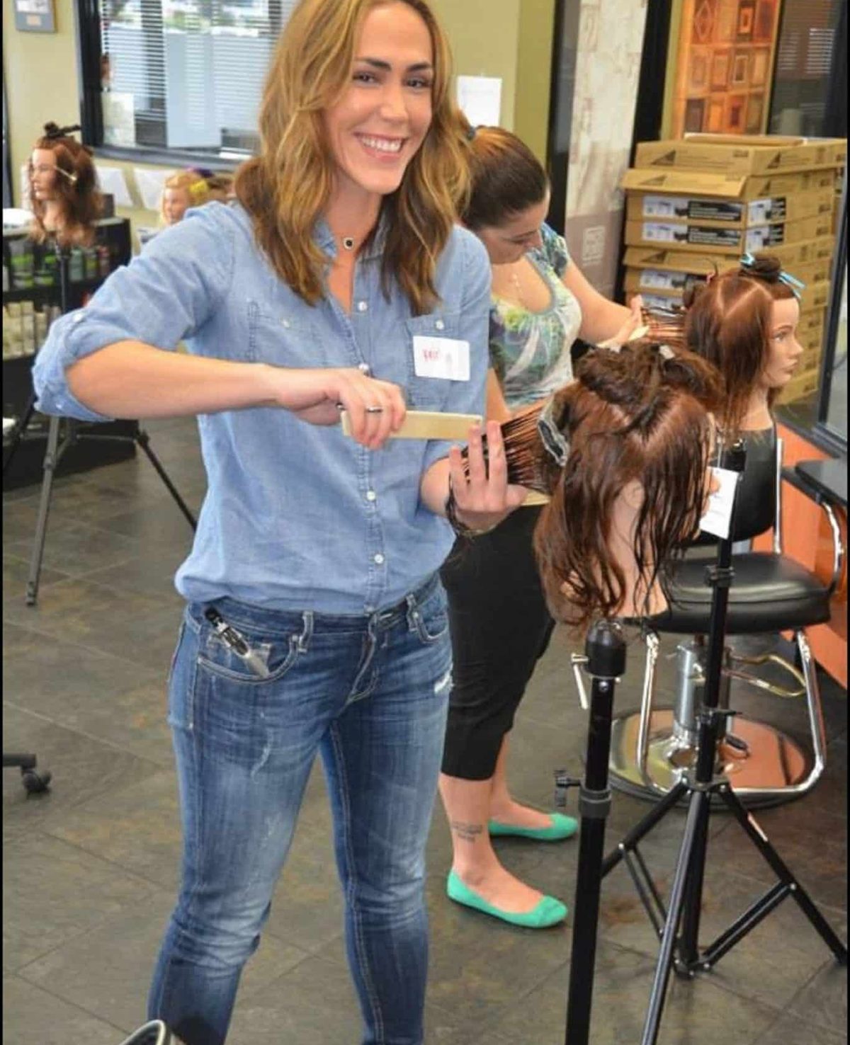 Foils being placed on a mannequin during a color lesson